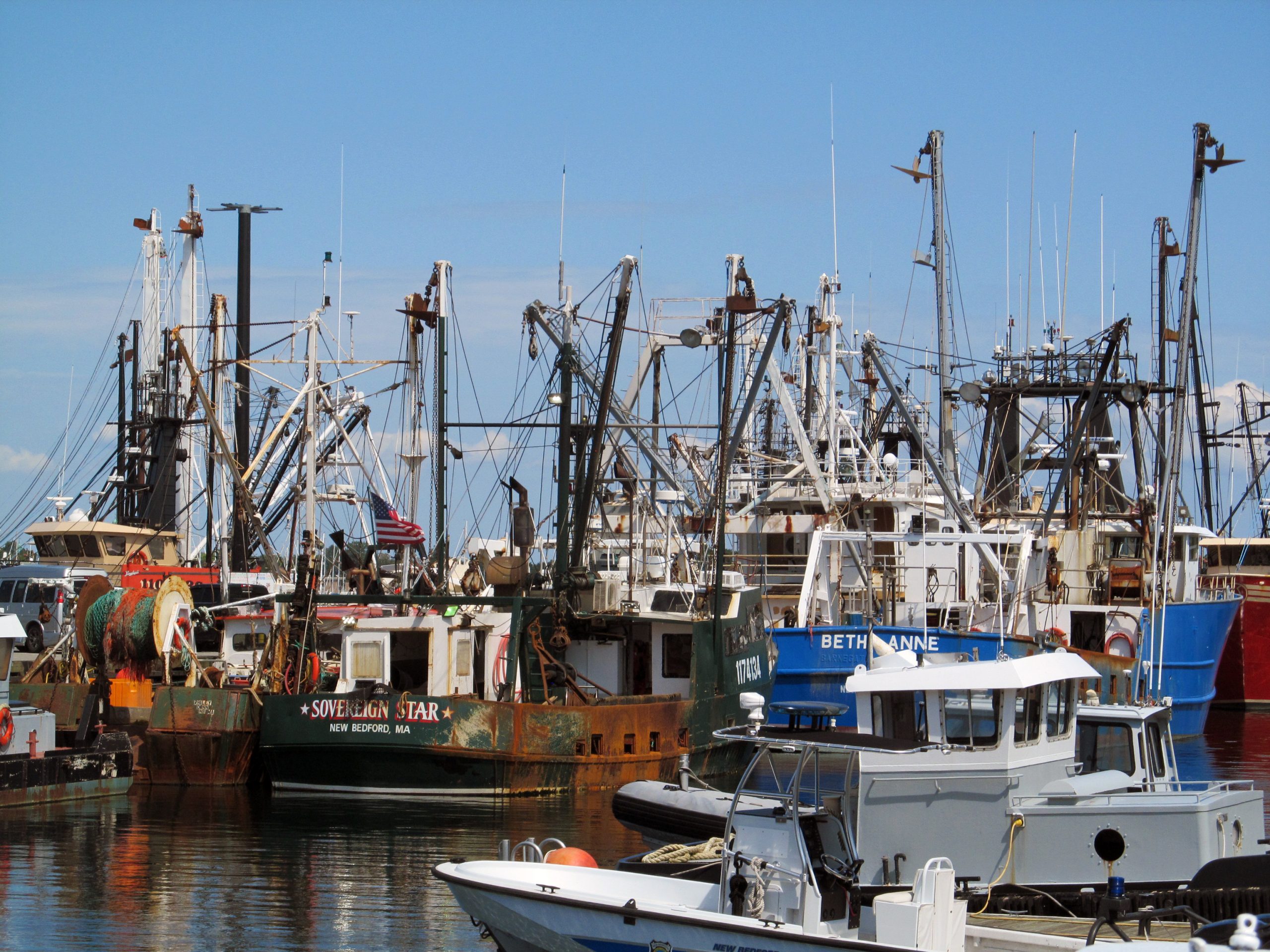 The fishing fleet at New Bedford harbor — the coastal heritage that shapes Loft & Strand